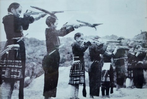 Hmong people undertake military training.