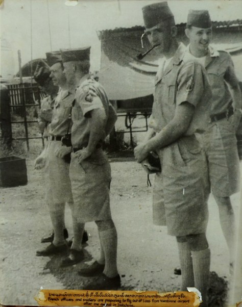 French officers and soldiers preparing to fly out of Laos from Vientiane Airport after the defeat in Indochina.