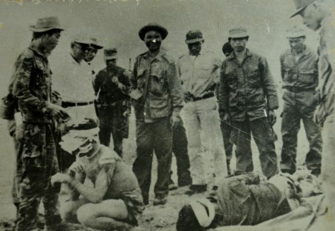 Vong Pao (smiling in the center of the picture) the commander of the special force the key henchman of the US imperialist savagely murdered the Lao people