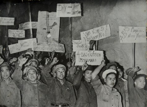 The army and the people rally against air rades ordered by president johnson to destroy the lao liberated zone in 1964